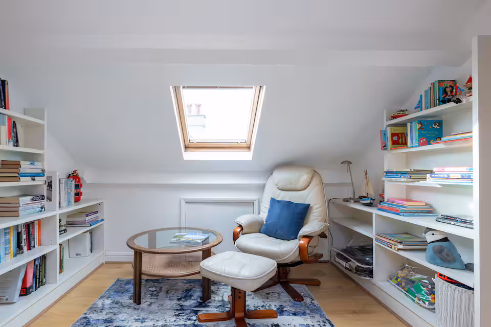 Library area with both adult and children reading books